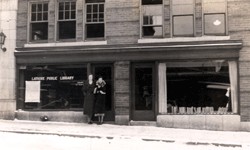 Lois Anthony and Madelyn McCarthy Blair stand in front of the Masonic Building in 1936.